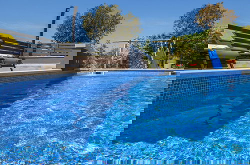 Foto 40 - Villa with Swimming Pool, Outdoor Kitchen, Sauna, Hot Tub, Play Area, Sea View