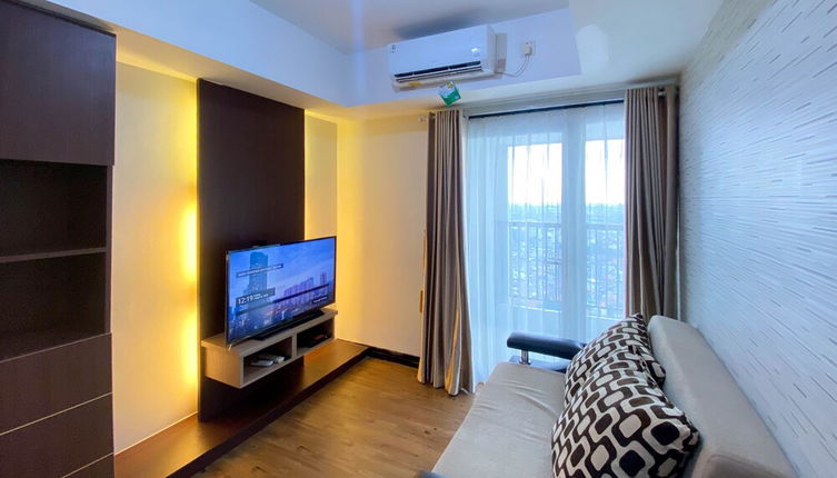 Foto 1 - Comfy And Minimalist 1Br At The Wave Kuningan Apartment