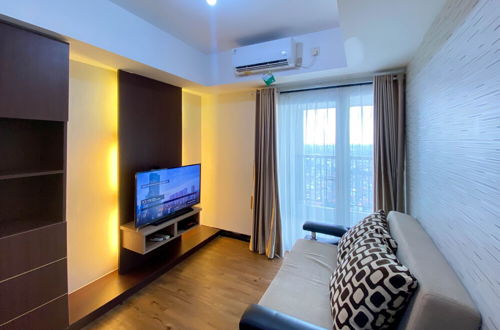 Photo 1 - Comfy And Minimalist 1Br At The Wave Kuningan Apartment