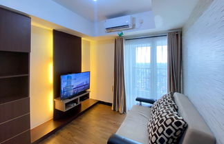 Photo 1 - Comfy And Minimalist 1Br At The Wave Kuningan Apartment