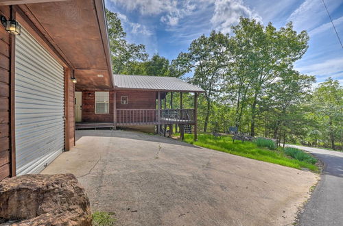 Photo 13 - Lush Garfield Cabin w/ Community Pool & Lake