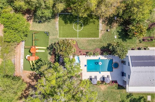 Photo 18 - Luxe Largo Retreat: Pool, Games, Basketball & More