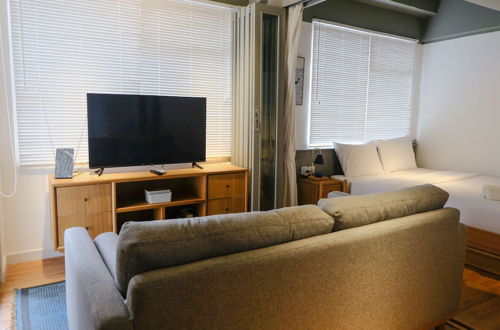 Foto 8 - Studio With Private Living Room At Jarrdin Cihampelas Apartment
