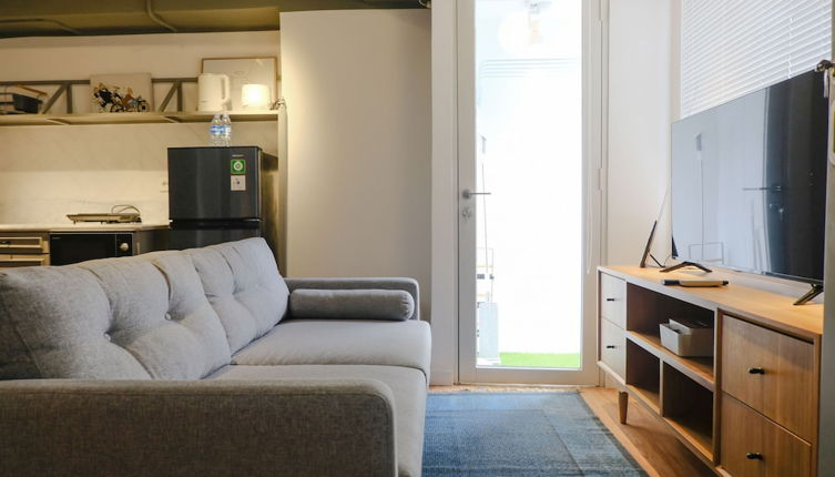 Foto 1 - Studio With Private Living Room At Jarrdin Cihampelas Apartment