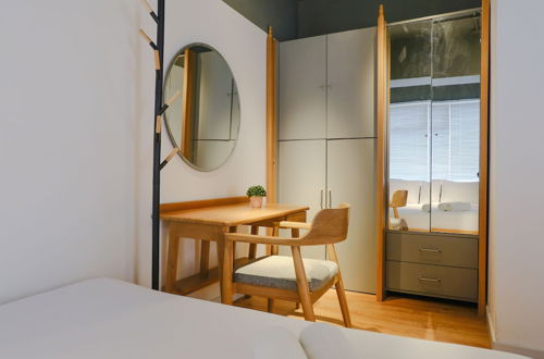 Foto 5 - Studio With Private Living Room At Jarrdin Cihampelas Apartment