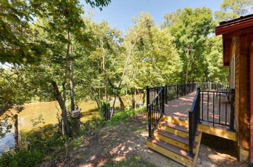 Photo 12 - Riverfront Covington Cabin w/ Deck & Fire Pit