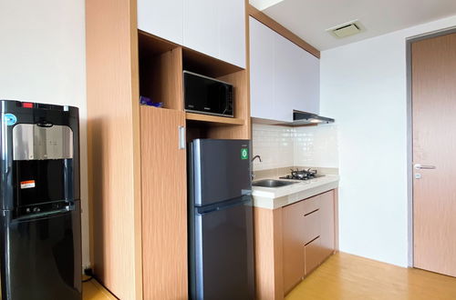 Photo 11 - Nice And Cozy Studio Apartment At Vasanta Innopark