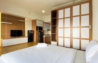 Photo 2 - Nice And Cozy Studio Apartment At Vasanta Innopark