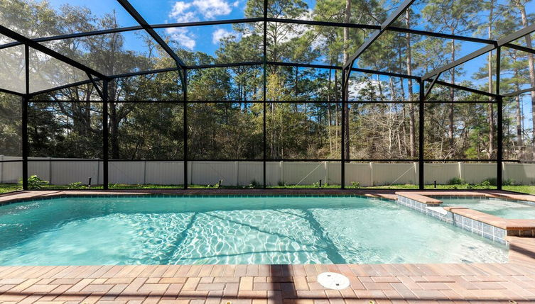 Photo 1 - Fabulous 8BR Villa Near Disney w Greenview Pool