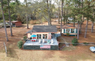 Photo 1 - Lakeside Pleasure Island Cabin w/ Deck & Gas Grill