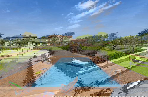 Foto 45 - Inviting Holiday Home in San Costanzo With Swimming Pool