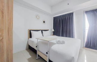 Foto 2 - Compact And Homey Studio Tamansari Bintaro Mansion Apartment