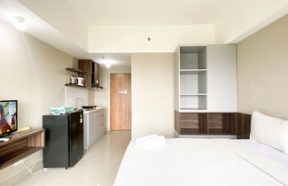 Photo 2 - Comfy And Homey Studio At Gateway Park Lrt City Bekasi Apartment