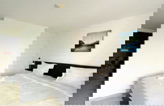 Foto 2 - Comfy Studio With Twin Bed At Enviro Apartment