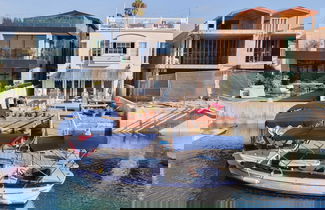 Photo 1 - Canalfront Charmer by Avantstay Waterfront w/ Shared Dock + Hot Tub