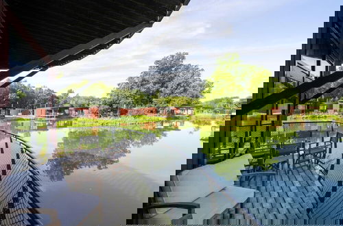 Foto 16 - Lake Bungalow With Terrace by Belvilla