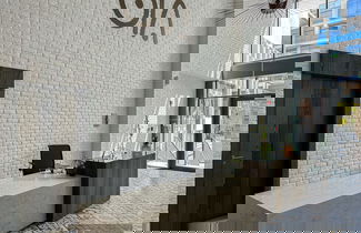 Foto 2 - WelHome - Prime 1BR Apartment at Oia Residence