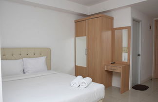 Foto 3 - Cozy And Strategic Studio At Bassura City Apartment