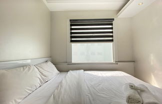 Photo 1 - Deluxe & Stylish 2BR at Grand Asia Afrika Apartment near Braga City Walk