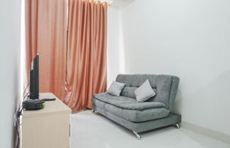 Foto 3 - Comfy 1BR Sedayu City Suites Apartment