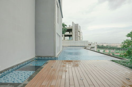Photo 10 - Comfy 1BR Sedayu City Suites Apartment