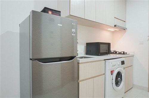 Foto 5 - Comfy 1BR Sedayu City Suites Apartment