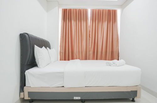 Photo 2 - Comfy 1BR Sedayu City Suites Apartment