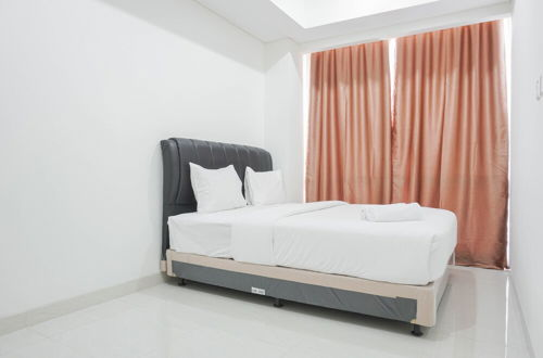 Foto 1 - Comfy 1BR Sedayu City Suites Apartment