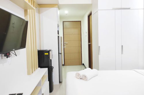 Photo 11 - Tranquil Studio Apartment At Vida View Makassar