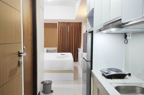 Photo 10 - Tranquil Studio Apartment At Vida View Makassar