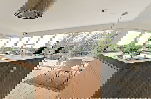 Foto 7 - Modern Holiday Home in Brovst with Hot Tub
