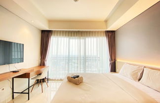 Photo 1 - Cozy Studio Room At Green Kosambi (Greko) Apartment