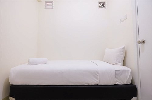 Photo 8 - 2 Bedrooms at Green Pramuka City Apartment By Travelio