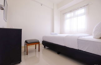 Foto 1 - 2 Bedrooms at Green Pramuka City Apartment By Travelio