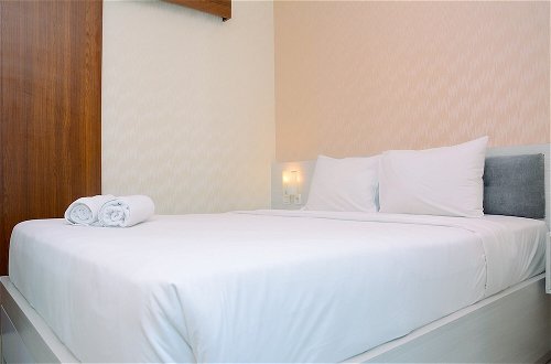 Foto 1 - Comfy with Modern Style 1BR Grand Kamala Lagoon Apartment