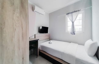 Foto 1 - Homey Studio at Alesha Vanya Park BSD Guest House (Sharing Bathroom)