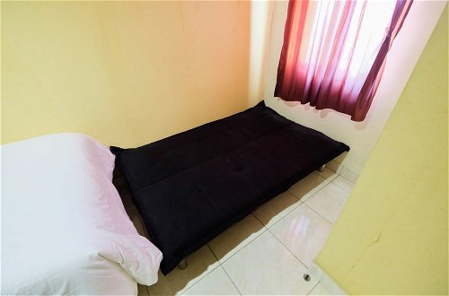 Photo 5 - Modern 2BR at City Home Apartment with Sofa Bed near MOI