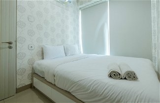Foto 2 - Comfy and Modern 2BR Grand Kamala Lagoon Apartment