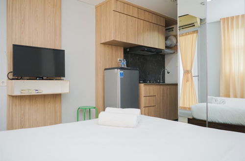 Photo 12 - Elegant And Comfy Studio Apartment At Bintaro Icon