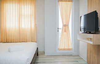 Photo 2 - Elegant And Comfy Studio Apartment At Bintaro Icon