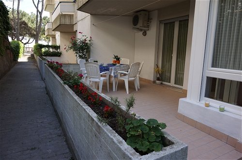 Photo 1 - Nice Renewed Beachfront Flat With Patio on the Ground Floor by Beahost Rentals