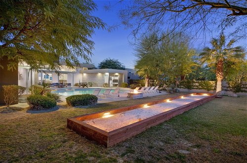 Photo 4 - Polo Villa 7 by Avantstay Features Entertainer's Backyard + Game Room 260316 5 Bedrooms