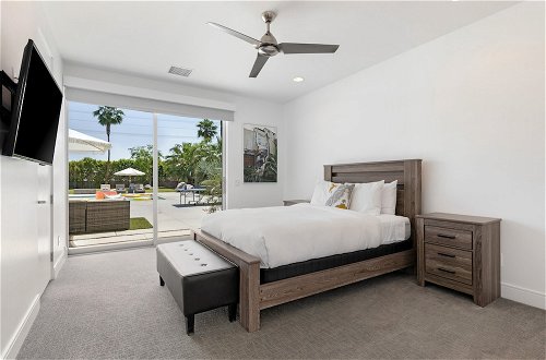 Photo 20 - Polo Villa 7 by Avantstay Features Entertainer's Backyard + Game Room 260316 5 Bedrooms