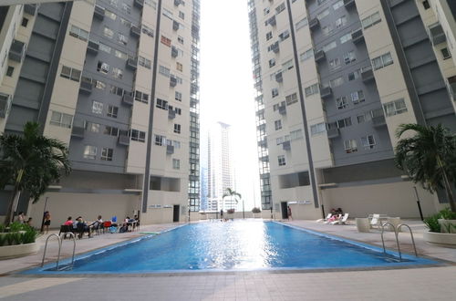 Foto 12 - Oasis Regency at Fort Victoria BGC