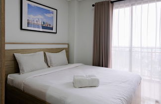 Photo 1 - Cozy Studio Room Apartment at Springwood Residence