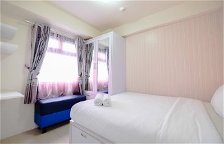 Photo 2 - Comfort 2BR with Pool View Green Pramuka City Apartment