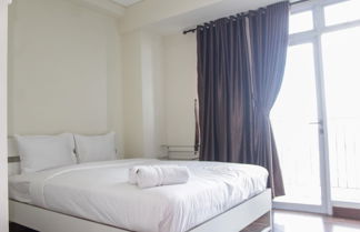 Photo 1 - Homey Studio with City View Apartment @ Puri Orchard