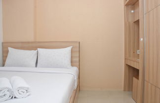 Photo 2 - Comfortable 2Br Apartment At Bassura City