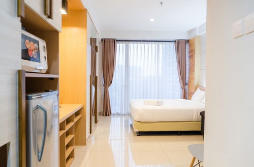 Foto 6 - Comfy Studio At Dago Suites Apartment