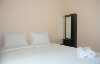 Photo 2 - Simple and Comfortable 2BR at City Home MOI Apartment